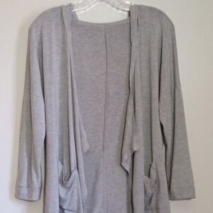 Lightweight jersey knit waterfall lounging cardigan with patch pockets